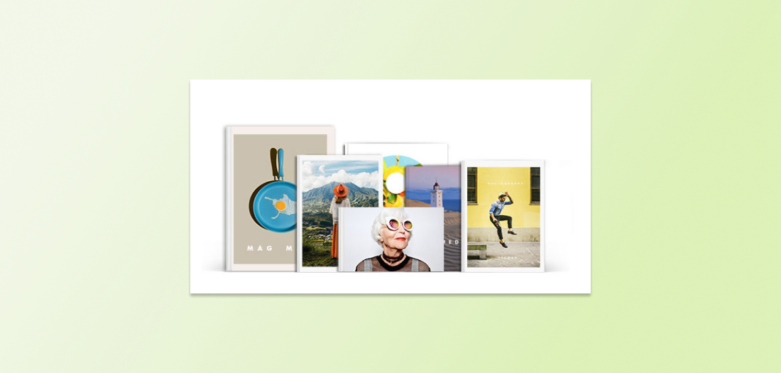 A selection of print-on-demand books by Blurb with an assortment of brightly colored cover images.