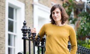 Guardian journalist Paula Cocozza outside her house in Dalston. 
Photograph by Felix Clay