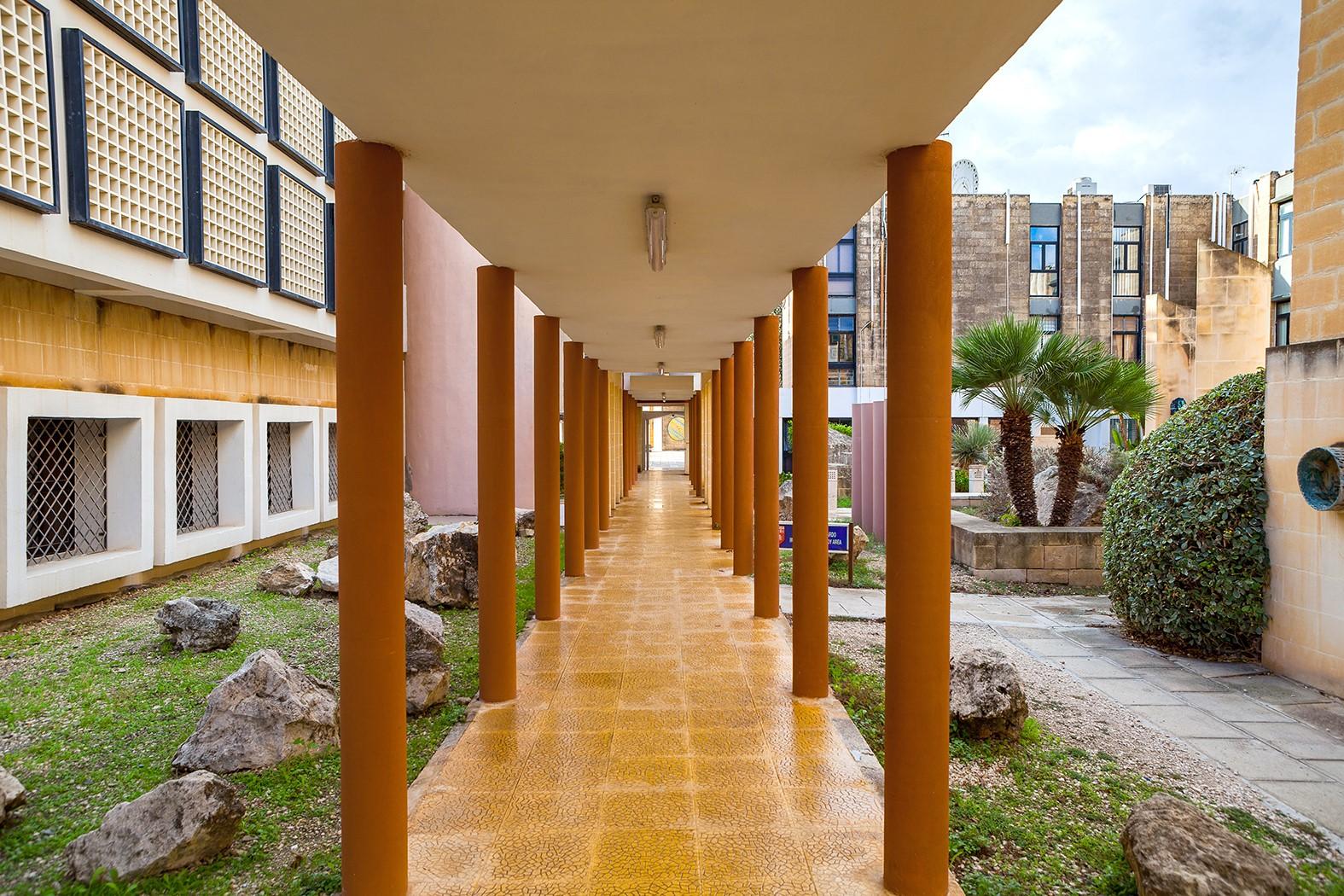 Heywood espouses, in this book, a social justice education and community engagement by universities. Pictured is a path within the University of Malta. Photo: Shutterstock.com