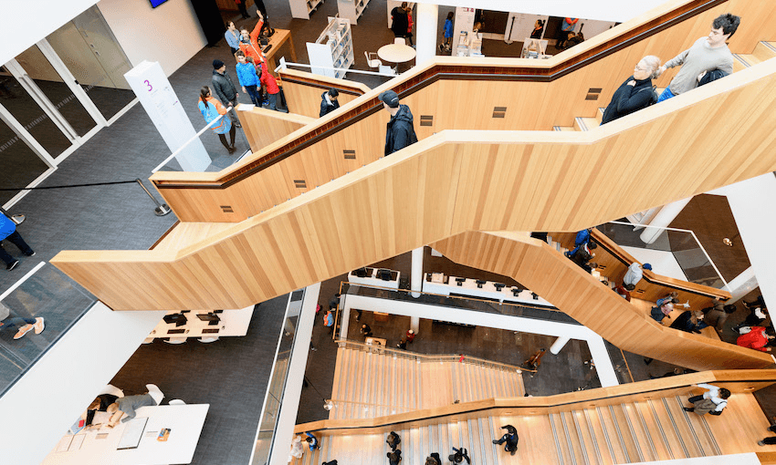 a wooden stair case in brightly lit daylight