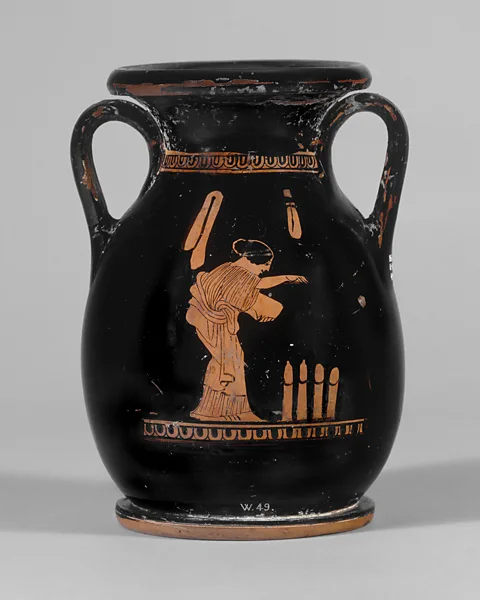 British Museum An ancient Greek vase depicting a woman sprinkling seeds over phalli, which were employed in fertility rituals (Credit: British Museum)