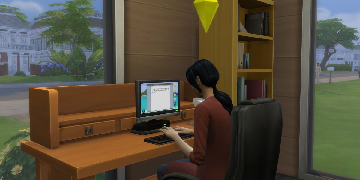 sim sitting at computer writing
