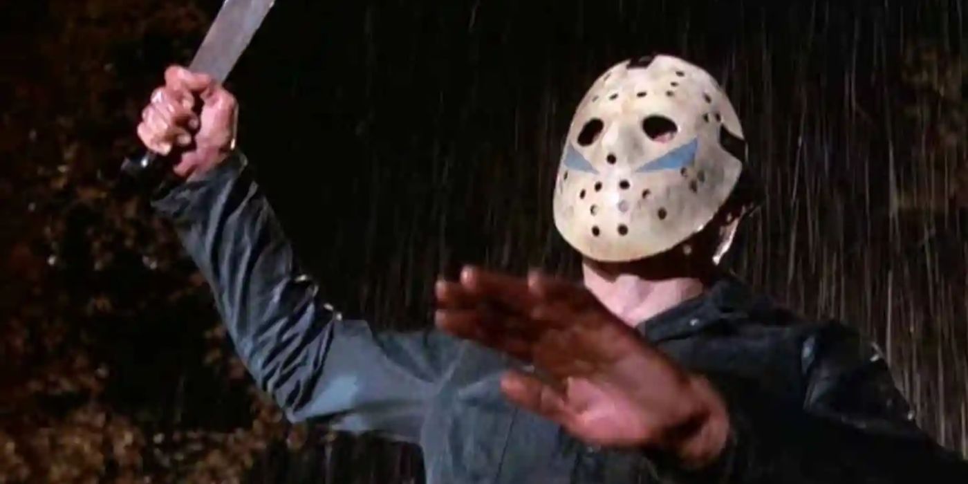 The false Jason Voorhees raises his knife in Friday the 13th V.