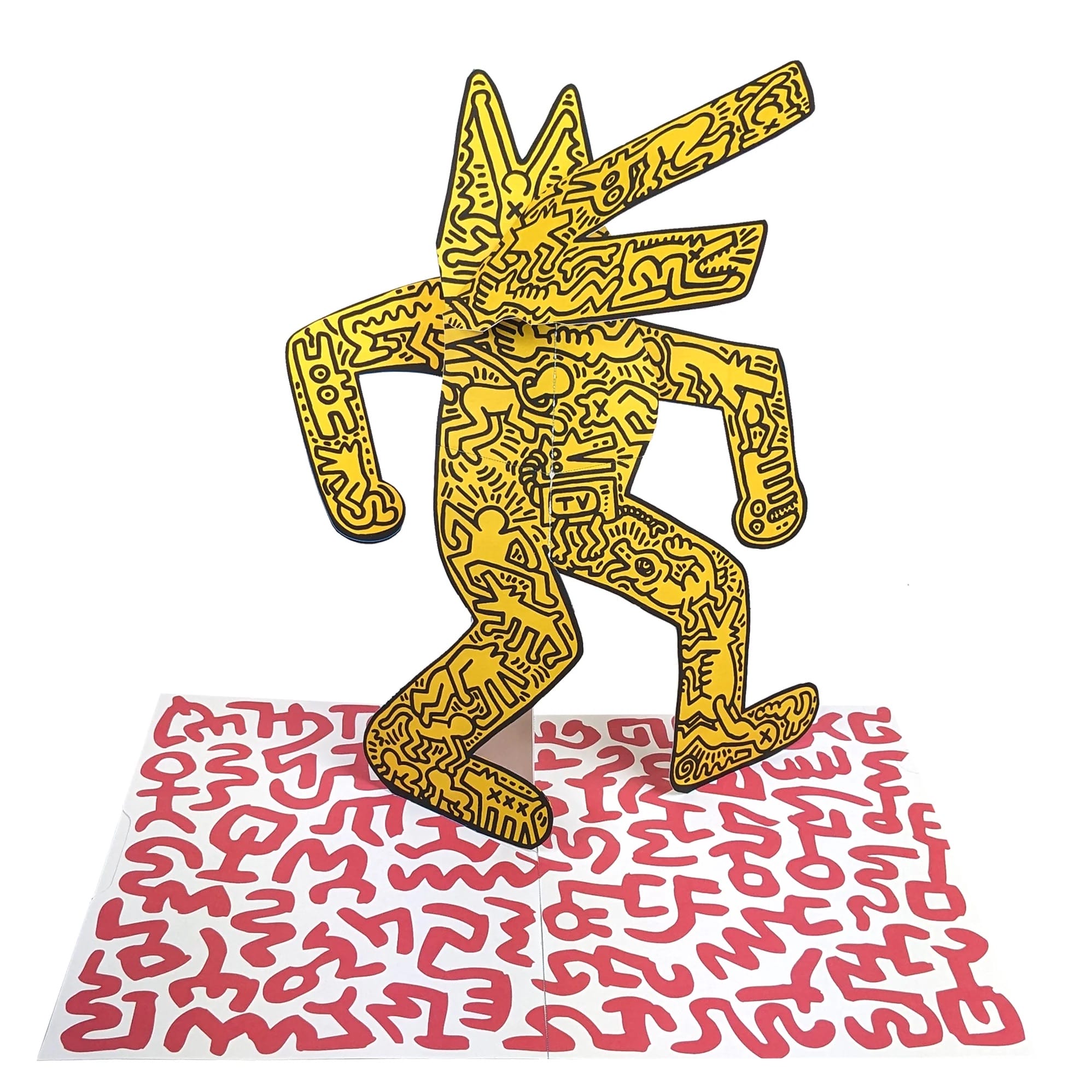 a pop-up paper dog figure with a yellow body and little black doodles inside of various shapes and other figures, by Keith Haring from a pop-up book