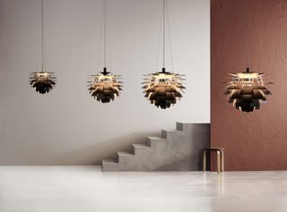 Louis Poulsen campaign image from 2020, showing the newly launched black version of the PH Artichoke in four sizes.